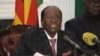Zimbabwean President Robert Mugabe delivers a live speech to the nation, at State House, in Harare, Zimbabwe, Nov, 19, 2017. Mugabe baffled the country by ending his address without announcing his resignation.