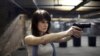 RUSSIA -- Maria Butina, who pleaded guilty on December 13, 2018, to conspiracy to act illegally as an unregistered Russian agent, photographed at a shooting range in Moscow, April 22, 2012.