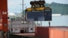 FILE - Shipping containers are seen on a cargo vessel at the Dachan Bay Terminals in Shenzhen, Guangdong province, China, July 12, 2018.