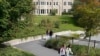 FILE - College students wear masks our of concern for the coronavirus on the Boston College campus, Sept. 17, 2020, in Boston.