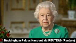 United Kingdom, London, Buckingham Palace handout image of Britain's Queen Elizabeth during her address to the nation and the Commonwealth in relation to the coronavirus epidemic
