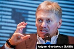 RUSSIA -- Kremlin spokesman Dmitry Peskov gestures as he speaks during an interview at the MediaDen Forum marking 5 years of Kommersant Journalism Academy, in Moscow, February 6, 2019