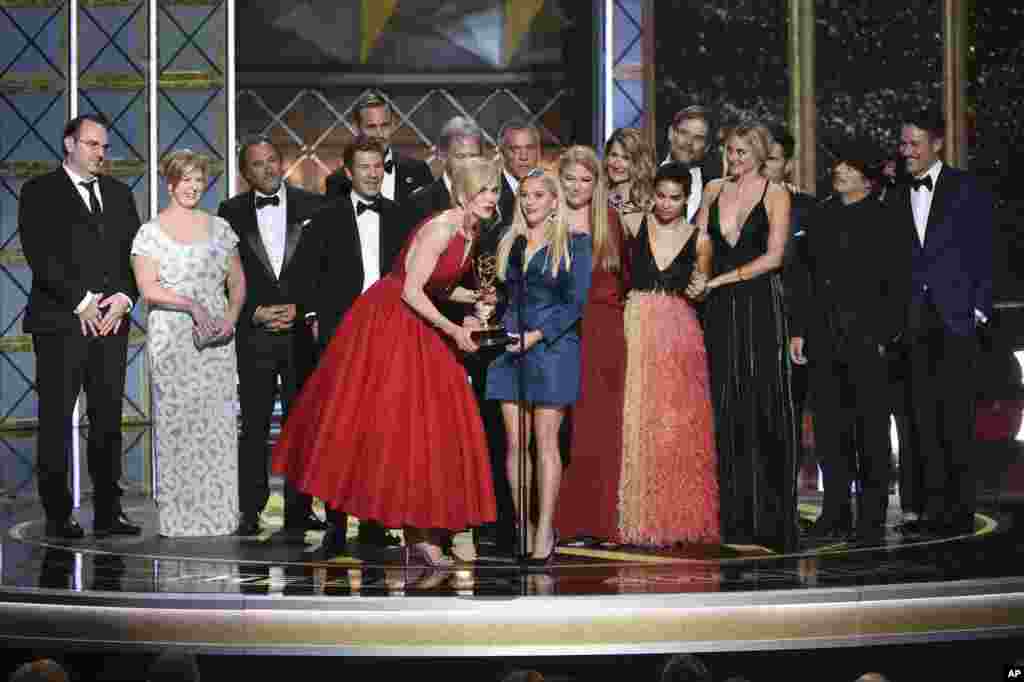 Nicole Kidman, left, and Reese Witherspoon accept the award for Outstanding Limited Series for "Big Little Lies" at the 69th Primetime Emmy Awards, Sept. 17, 2017, at the Microsoft Theater in Los Angeles.