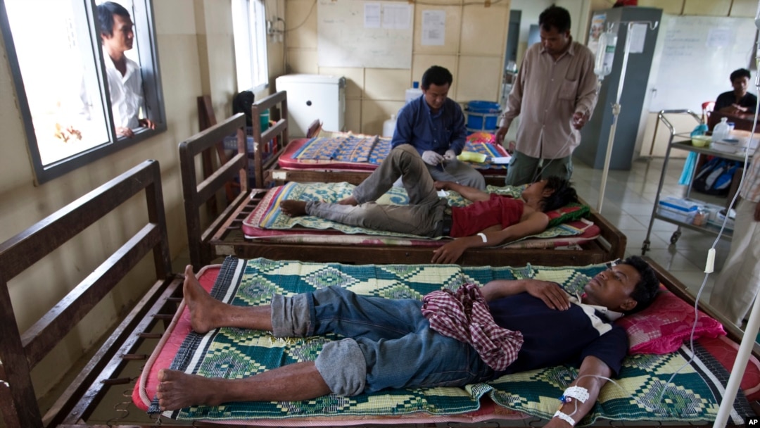 FILE - This Aug. 26, 2009 photo shows patients suffering from malaria being treated at the hospital in Pailin, Cambodia. 