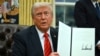 Trump signs order aimed at ending benefits for some immigrants