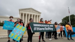 In this June 18, 2020, photo, Deferred Action for Childhood Arrivals (DACA) students celebrate in front of the Supreme Court after the Supreme Court rejected President Donald Trump's effort to end legal protections for young immigrants in Washington…