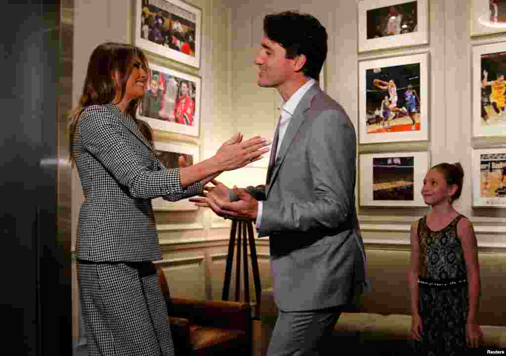 U.S. first lady Melania Trump is greeted by Canada's Prime Minister Justin Trudeau and his daughter Ella-Grace as she arrives to attend the opening ceremony of the Invictus Games in Toronto, Canada, Sept. 23, 2017.