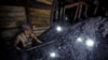 FILE - A miner works inside the Lutugin coal mine in Chystiakove (Torez) in the Donetsk region, Russian-controlled Ukraine, Aug. 9, 2023. 