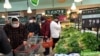 Chinese Farmers, Supermarkets Race to Supply Food to Locked Down Wuhan