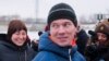 FILE - Russian opposition activist Ildar Dadin (center) speaks to journalists as his wife Anastasia Zotova (left) smiles upon leaving a prison in Rubtsovsk, Russia, Feb. 26, 2017. 
