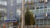 FILE - The logo of Chinese gene firm BGI Group is seen at its building in Beijing, China, March 25, 2021.