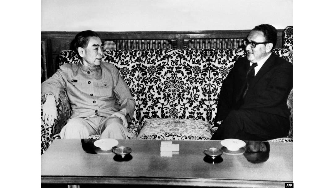 FILE - U.S. Special Envoy Henry Kissinger, right, meets with China's Prime Minister Zhou Enlai, in Beijing, July 1971.