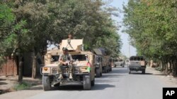 Avganistanske bezbednosne snage nakon borbi sa talibanskim borcima u Kuguzu, Avganistan, 31. avgusta 2019.