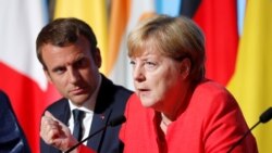 Emanuel Makron i Angela Merkel