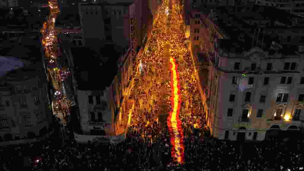 People who are refusing to recognize Peru's new government gather to protest in Lima, Nov. 14, 2020.