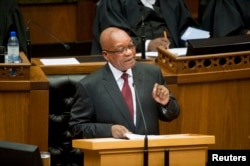 FILE - South Africa's President Jacob Zuma delivers his State of the Nation address at Parliament in Cape Town, Feb. 13, 2014.