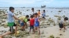 Children of newly arrived Rohingya refugees play at a beach on Sabang island, Aceh province, Indonesia, on Dec. 2, 2023. With the year not over yet, the number of Rohingya fleeing refugee camps in Bangladesh by boat already has eclipsed the 2022 total.