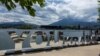 A sign is displayed in front of the Burgenstock Resort ahead of the Ukraine Peace Summit near Lucerne, Switzerland, June 14, 2024.
