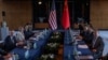 Chinese Foreign Minister Wang Yi, far right, and White House National Security Adviser Jake Sullivan, far left, pose for a photo before talks at Yanqi Lake in Beijing, China, on Aug. 27, 2024.