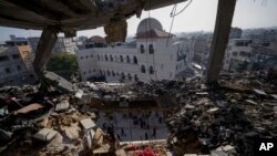 Oštećene zgrade u Rafi, na jugu Gaze (Foto: AP/Fatima Shbair)