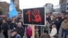 Thousands march in Serbia to mark 1 month since roof collapse killed 15 people