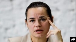 Sviatlana Tsikhanouskaya, a candidate for the presidency, speaks at a news conference after the Belarusian presidential election in Minsk, Belarus, Aug. 10, 2020.