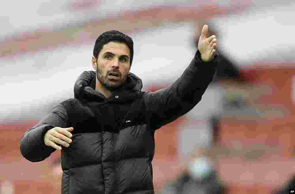Mikel Arteta, Arsenal - Manager Arsenal manager Mikel Arteta tested positive for COVID-19 on March 12, according to a statement on the club's official website. He completed his recovery and returned to work with the Premier League side. Photo: Arsenal's manager Mikel Arteta gestures from the side lines to his players during the English Premier League soccer match between Arsenal and Sheffield United at the Emirates Stadium in London, Sunday, Oct. 4, 2020. (AP Photo/Kirsty Wigglesworth)