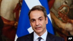 Grčki premijer Kirjakos Micotakis tokom konferencije za štampu sa svojim italijanskim kolegom Đuzepeom Kontem, u Rimu, 26. novembra 2019.