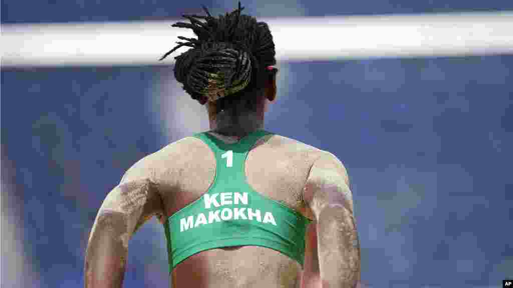Gaudencia Makokha, of Kenya, is covered in sand as she competes during a women's beach volleyball match against the United States at the 2020 Summer Olympics, Thursday, July 29, 2021, in Tokyo, Japan. (AP Photo/Petros Giannakouris)