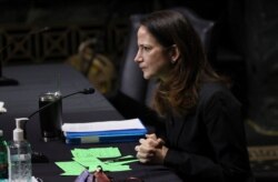 FILE - Then-nominee for national intelligence director Avril Haines speaks during a confirmation hearing in Washington, Jan. 19, 2021. (Joe Raedle/Pool via AP)