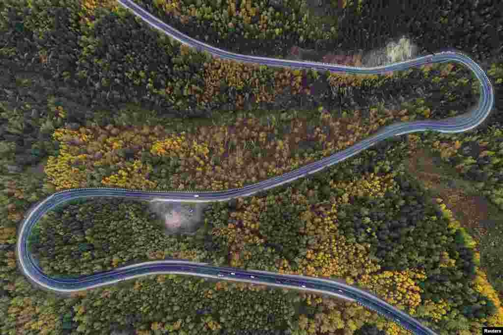 An aerial view shows the R257 "Yenisei" federal highway in the Siberian Taiga area outside Krasnoyarsk, Russia.