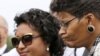 FILE - Kadiatou Diallo, left, attends a graveside ceremony honoring Emmett Till in Alsip, Ill., Aug. 28, 2015. The boy's murder 60 years earlier in Mississippi galvanized U.S. civil rights activists. 