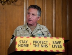 FILE - Britain's Chief of Defense Staff General Nick Carter speaks during a remote press conference, inside 10 Downing Street in central London, April 22, 2020, in this handout image released by 10 Downing Street.