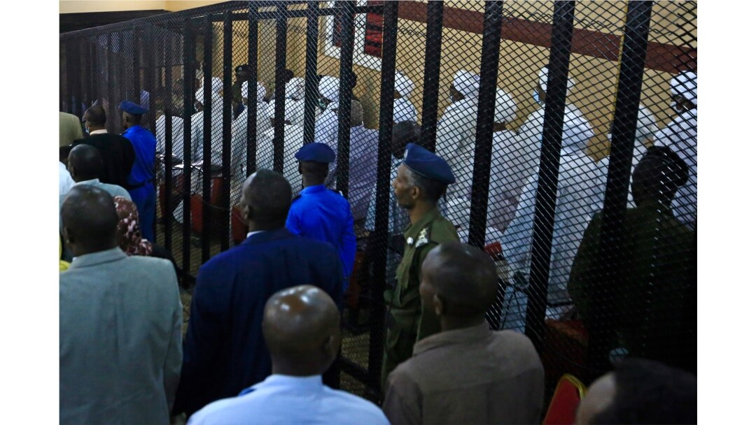 A partial view shows the trial of Sudan's ousted president Omar al-Bashir along with other co-accused at the Khartoum courthouse in the Sudanese capital, July 21, 2020.
