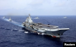 Kineski nosač aviona Liaoning učestvuje u vojnim vežbama Kineske narodne oslobodilačke armije u zapadnom Pacifiku, 18. aprila 2018.
