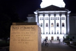 The base of a statue of Col. Hans Christian Heg, a Union Civil War colonel who fought for the end of slavery, remains after it was torn down by protesters during demonstrations in Madison, Wis., June 23, 2020.