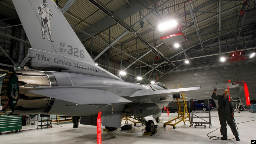 FILE - A U.S. F-16 fighter jet is seen in a hangar in South Burlington, Vermont, Dec. 17, 2012.