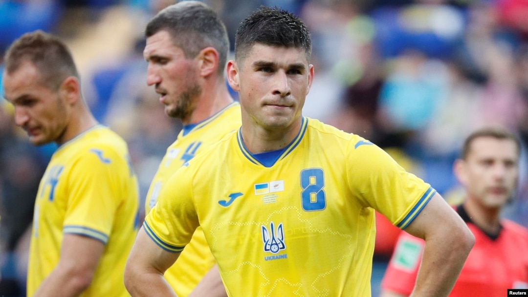 FILE - Ukraine's Ruslan Malinovskiy wears the newly introduced national team jersey emblazoned with a map of Ukraine that includes Russia-annexed Crimea, during an international friendly match against Cyprus, in Kharkiv, Ukraine, June 7, 2021.