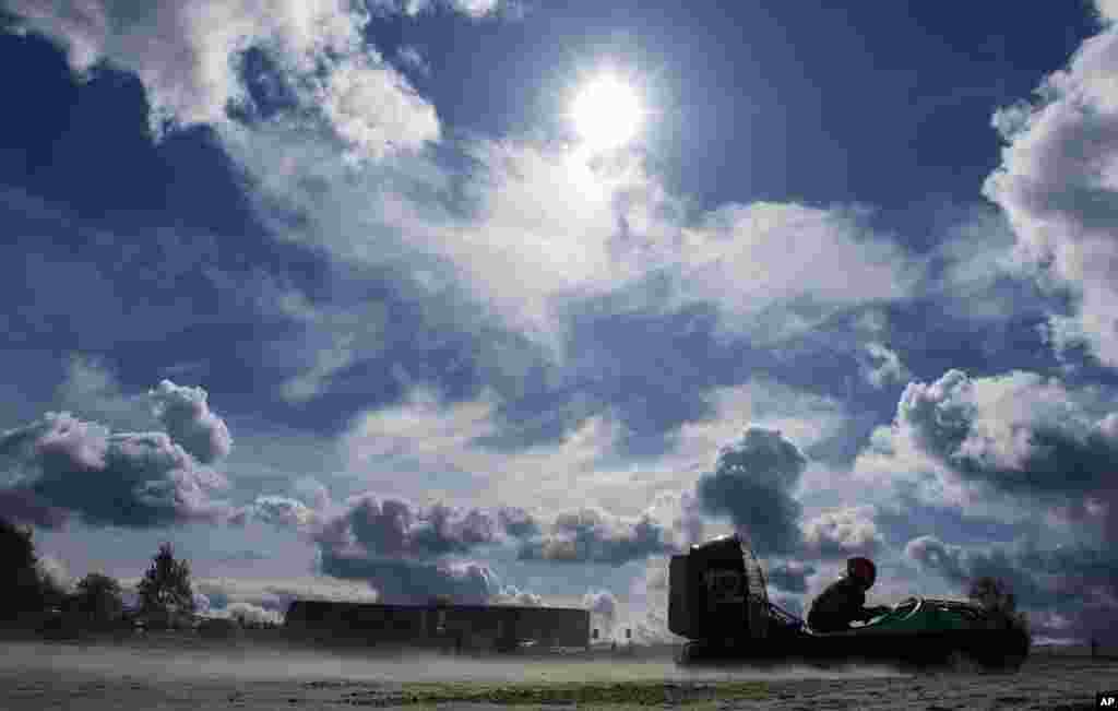 Michael Metzner of Germany speeds up during the Hovercraft European Formula 1 warm up race in Saalburg, central Germany.