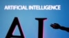 FILE PHOTO: Illustration shows AI (Artificial Intelligence) letters and robot hand miniature