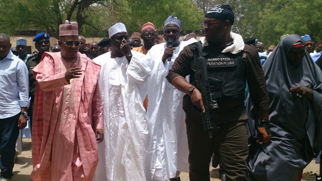Borno State governor Kashim Shettima (left) visited the Chibok school where gunmen abducted more than 200 girls early last week.