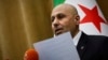 Yasser Farhan, spokesperson for the Syrian fact-finding committee tasked with investigating violence and revenge killing targeting the Alawite minority sect along the Syrian coast, holds a press conference in Damascus on March 11, 2025.