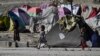 FILE - Internally displaced Afghan children play at the Saray Shamali IDP camp in Kabul, Afghanistan, Nov. 2, 2021. 