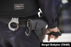 MOSCOW REGION, RUSSIA - AUGUST 1, 2018: A police officer at the Moscow Regional Court during a hearing into the GTA Gang case.