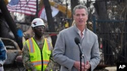 FILE - California Governor Gavin Newsom speaks during a visit to an area impacted by the Eaton Fire, in Altadena, California, Feb. 11, 2025.