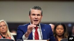 Pete Hegseth, President-elect Donald Trump's choice to be Defense secretary, appears before the Senate Armed Services Committee for his confirmation hearing, at the Capitol in Washington, Jan. 14, 2025. 