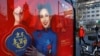 A JD.com advertisement with an image of freestyle skier Eileen Gu is seen at a bus stop in Beijing, China, Jan. 11, 2022