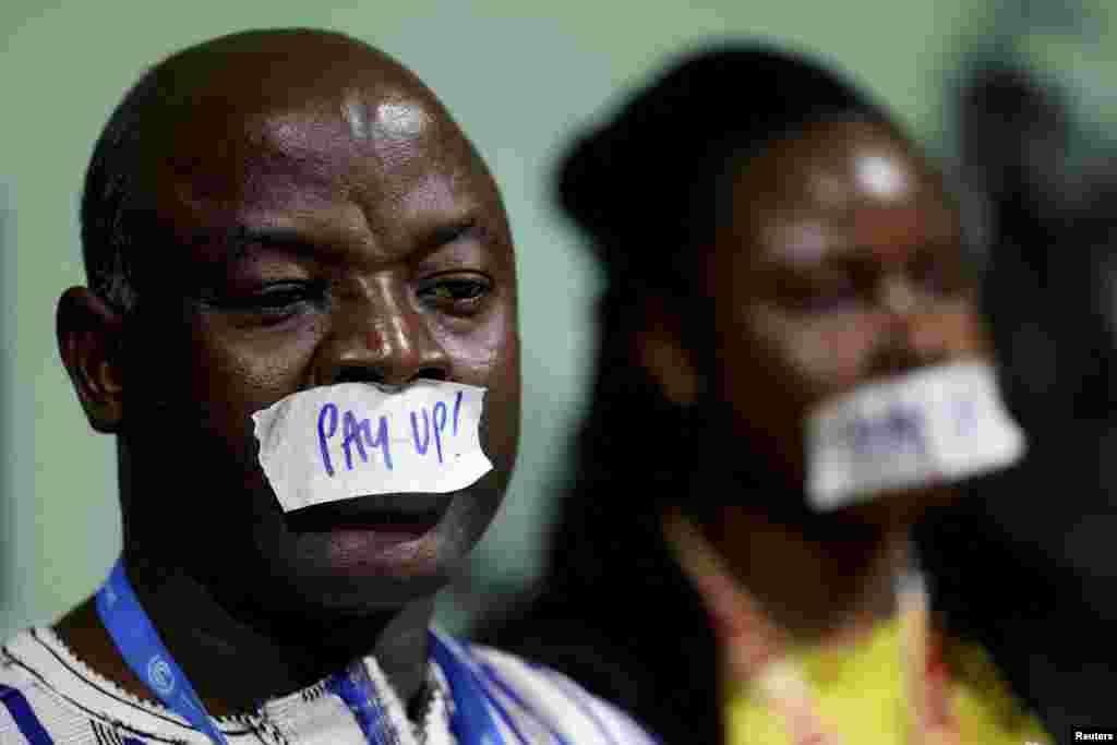 Activists take part in a protest calling on developed nations to provide financing to fight climate change, during the COP29 United Nations Climate Change Conference, in Baku, Azerbaijan. REUTERS/Murad Sezer