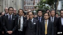 香港大律師公會成員和法律界人士遊行前往中聯辦反對港府計劃批准送中法案。 （2019年6月6日）