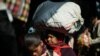 18 dead in India stampede to catch trains to Hindu mega-festival